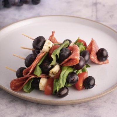 Bocconcini with Grilled Blue Grapes and Basil Skewers